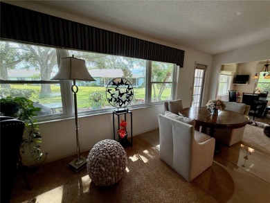 You'll truly have it *made in the shade* in this gorgeous condo on Falcon Watch Golf Club in Florida - for sale on GolfHomes.com, golf home, golf lot