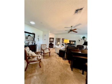 You'll truly have it *made in the shade* in this gorgeous condo on Falcon Watch Golf Club in Florida - for sale on GolfHomes.com, golf home, golf lot