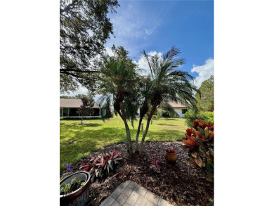 You'll truly have it *made in the shade* in this gorgeous condo on Falcon Watch Golf Club in Florida - for sale on GolfHomes.com, golf home, golf lot