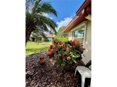 You'll truly have it *made in the shade* in this gorgeous condo on Falcon Watch Golf Club in Florida - for sale on GolfHomes.com, golf home, golf lot
