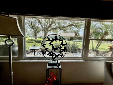 You'll truly have it *made in the shade* in this gorgeous condo on Falcon Watch Golf Club in Florida - for sale on GolfHomes.com, golf home, golf lot