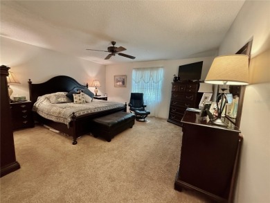 You'll truly have it *made in the shade* in this gorgeous condo on Falcon Watch Golf Club in Florida - for sale on GolfHomes.com, golf home, golf lot