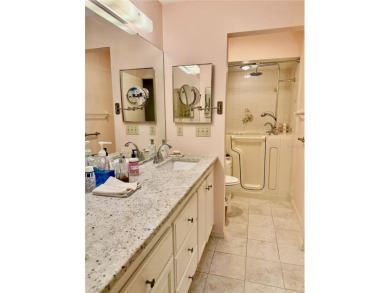 You'll truly have it *made in the shade* in this gorgeous condo on Falcon Watch Golf Club in Florida - for sale on GolfHomes.com, golf home, golf lot