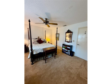 You'll truly have it *made in the shade* in this gorgeous condo on Falcon Watch Golf Club in Florida - for sale on GolfHomes.com, golf home, golf lot