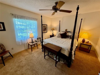 You'll truly have it *made in the shade* in this gorgeous condo on Falcon Watch Golf Club in Florida - for sale on GolfHomes.com, golf home, golf lot
