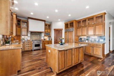 This home is the entertainer's paradise! Experience unparalleled on Raindance National Golf Course in Colorado - for sale on GolfHomes.com, golf home, golf lot