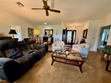 You'll truly have it *made in the shade* in this gorgeous condo on Falcon Watch Golf Club in Florida - for sale on GolfHomes.com, golf home, golf lot