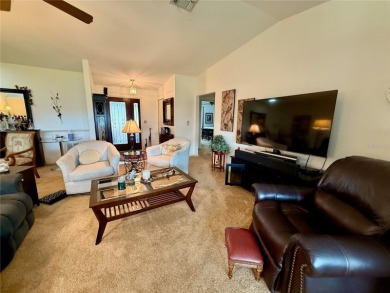 You'll truly have it *made in the shade* in this gorgeous condo on Falcon Watch Golf Club in Florida - for sale on GolfHomes.com, golf home, golf lot