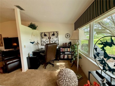 You'll truly have it *made in the shade* in this gorgeous condo on Falcon Watch Golf Club in Florida - for sale on GolfHomes.com, golf home, golf lot