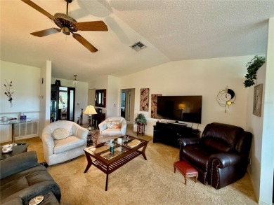 You'll truly have it *made in the shade* in this gorgeous condo on Falcon Watch Golf Club in Florida - for sale on GolfHomes.com, golf home, golf lot