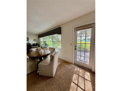 You'll truly have it *made in the shade* in this gorgeous condo on Falcon Watch Golf Club in Florida - for sale on GolfHomes.com, golf home, golf lot