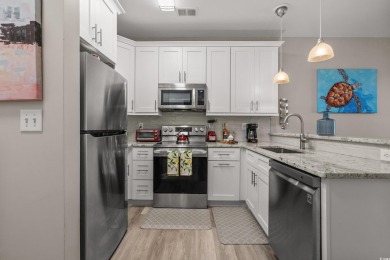 This completely renovated 2-bedroom, 2-bathroom first-floor on River Oaks Golf Plantation  in South Carolina - for sale on GolfHomes.com, golf home, golf lot