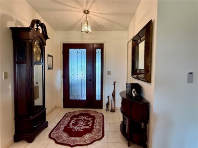 You'll truly have it *made in the shade* in this gorgeous condo on Falcon Watch Golf Club in Florida - for sale on GolfHomes.com, golf home, golf lot