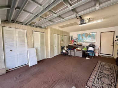 You'll truly have it *made in the shade* in this gorgeous condo on Falcon Watch Golf Club in Florida - for sale on GolfHomes.com, golf home, golf lot