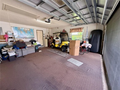 You'll truly have it *made in the shade* in this gorgeous condo on Falcon Watch Golf Club in Florida - for sale on GolfHomes.com, golf home, golf lot