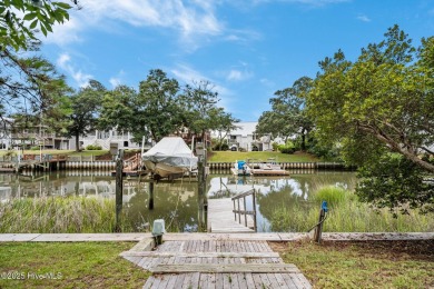 Sought after Davis Canal Front Property featuring boat lift on Founders Club At St. James Plantation in North Carolina - for sale on GolfHomes.com, golf home, golf lot
