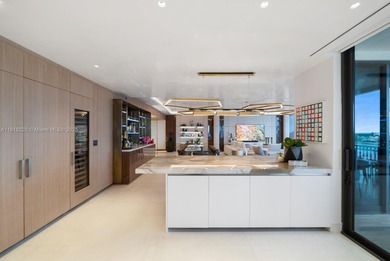 This elegantly designed 4-bedroom, 4.5-bath residence at Palazzo on Fisher Island Club in Florida - for sale on GolfHomes.com, golf home, golf lot