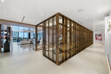 This elegantly designed 4-bedroom, 4.5-bath residence at Palazzo on Fisher Island Club in Florida - for sale on GolfHomes.com, golf home, golf lot