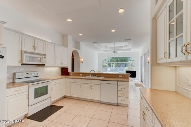 Spacious 3-bedroom, 2-bath home with a den located on the 7th on The Grand Club Cypress Course in Florida - for sale on GolfHomes.com, golf home, golf lot