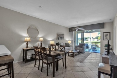 Charming top floor condo with stunning water and golf course on Legends Golf and Country Club in Florida - for sale on GolfHomes.com, golf home, golf lot
