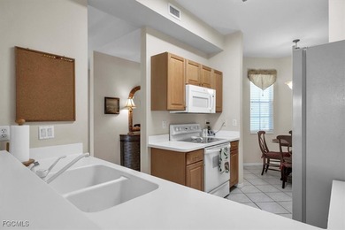 Charming top floor condo with stunning water and golf course on Legends Golf and Country Club in Florida - for sale on GolfHomes.com, golf home, golf lot