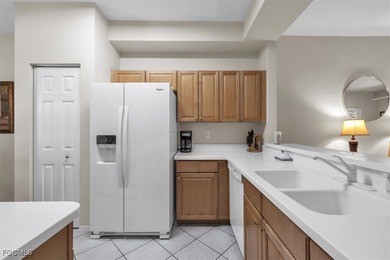 Charming top floor condo with stunning water and golf course on Legends Golf and Country Club in Florida - for sale on GolfHomes.com, golf home, golf lot