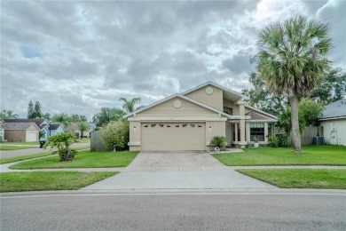 This lovely corner three-bedroom, two-bathroom home is in the on Eastwood Golf Club in Florida - for sale on GolfHomes.com, golf home, golf lot