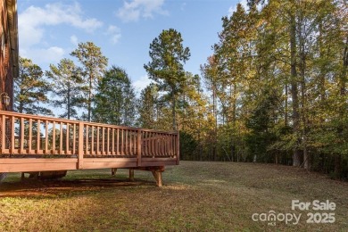 This Stately Brick home in The Palisades is situated new Lake on The Palisades Country Club in North Carolina - for sale on GolfHomes.com, golf home, golf lot