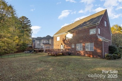 This Stately Brick home in The Palisades is situated new Lake on The Palisades Country Club in North Carolina - for sale on GolfHomes.com, golf home, golf lot