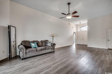 This beautifully maintained three-bedroom home offers a seamless on Heron Point Golf Club in South Carolina - for sale on GolfHomes.com, golf home, golf lot