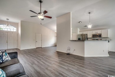 This beautifully maintained three-bedroom home offers a seamless on Heron Point Golf Club in South Carolina - for sale on GolfHomes.com, golf home, golf lot