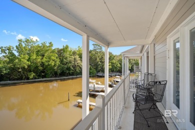 Private balconies, oversized boat slip, water views and bay on Lakewood Golf Club in Alabama - for sale on GolfHomes.com, golf home, golf lot