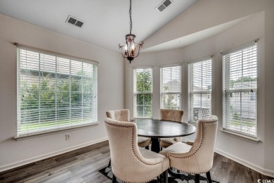 This beautifully maintained three-bedroom home offers a seamless on Heron Point Golf Club in South Carolina - for sale on GolfHomes.com, golf home, golf lot