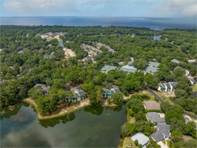 Welcome to lakefront living in the heart of Bluewater Bay! This on Golf Club at Bluewater Bay Resort in Florida - for sale on GolfHomes.com, golf home, golf lot