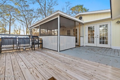 This charming residence is ideally located near the beach on Oyster Bay Golf Links in North Carolina - for sale on GolfHomes.com, golf home, golf lot