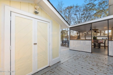 This charming residence is ideally located near the beach on Oyster Bay Golf Links in North Carolina - for sale on GolfHomes.com, golf home, golf lot