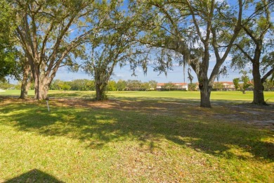 This townhouse is located on Meadow #1 of the Carrollwood on Carrollwood Country Club in Florida - for sale on GolfHomes.com, golf home, golf lot