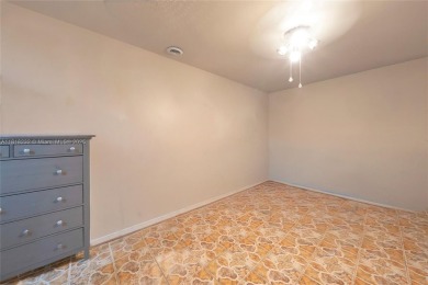 Welcome to 7517 N Augusta Drive, a beautifully maintained 3-bed on Country Club of Miami in Florida - for sale on GolfHomes.com, golf home, golf lot