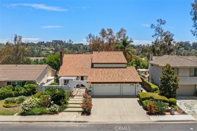 Welcome to this CHARMING two-story residence nestled in one of on Mission Viejo Country Club in California - for sale on GolfHomes.com, golf home, golf lot