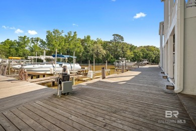 Private balconies, oversized boat slip, water views and bay on Lakewood Golf Club in Alabama - for sale on GolfHomes.com, golf home, golf lot