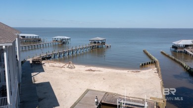 Private balconies, oversized boat slip, water views and bay on Lakewood Golf Club in Alabama - for sale on GolfHomes.com, golf home, golf lot