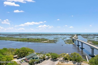 This charming residence is ideally located near the beach on Oyster Bay Golf Links in North Carolina - for sale on GolfHomes.com, golf home, golf lot