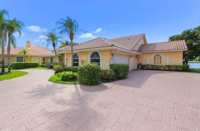 This incredible lakefront property is located in the gated on Greenview Cove Golf Club in Florida - for sale on GolfHomes.com, golf home, golf lot