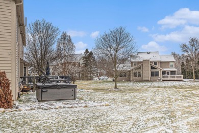 Peace and privacy are yours at this impressive brick home on a on Stonebridge Golf Club in Michigan - for sale on GolfHomes.com, golf home, golf lot