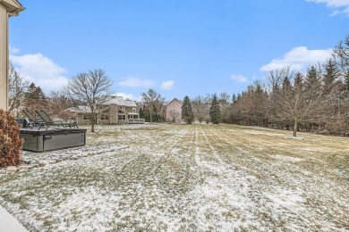 Peace and privacy are yours at this impressive brick home on a on Stonebridge Golf Club in Michigan - for sale on GolfHomes.com, golf home, golf lot