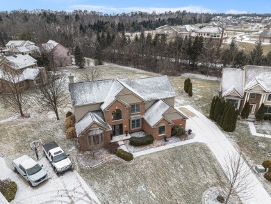 Peace and privacy are yours at this impressive brick home on a on Stonebridge Golf Club in Michigan - for sale on GolfHomes.com, golf home, golf lot