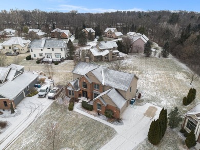 Peace and privacy are yours at this impressive brick home on a on Stonebridge Golf Club in Michigan - for sale on GolfHomes.com, golf home, golf lot