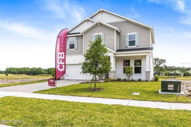 Welcome to 'The Lydia', a luxurious 2-story home in the on LPGA International Golf Course in Florida - for sale on GolfHomes.com, golf home, golf lot