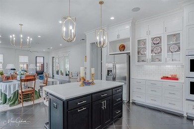 Perfectly positioned on a prime corner lot in Provenance, this on Southern Trace Country Club in Louisiana - for sale on GolfHomes.com, golf home, golf lot