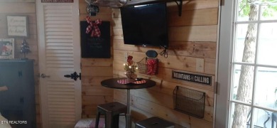 Lovely Cottage style living with 2 bedrooms, 2.5 baths! You must on Lake Tansi Village Country Club in Tennessee - for sale on GolfHomes.com, golf home, golf lot